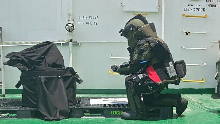 Indian Navy Explosive Ordnance Disposal (EOD) specialists conducting a high-risk recovery operation aboard MT Olympic Life near Kochi port.
