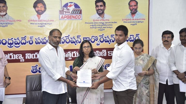 Gottipati Ravikumar handing over compassionate appointment orders to eligible APGENCO beneficiaries